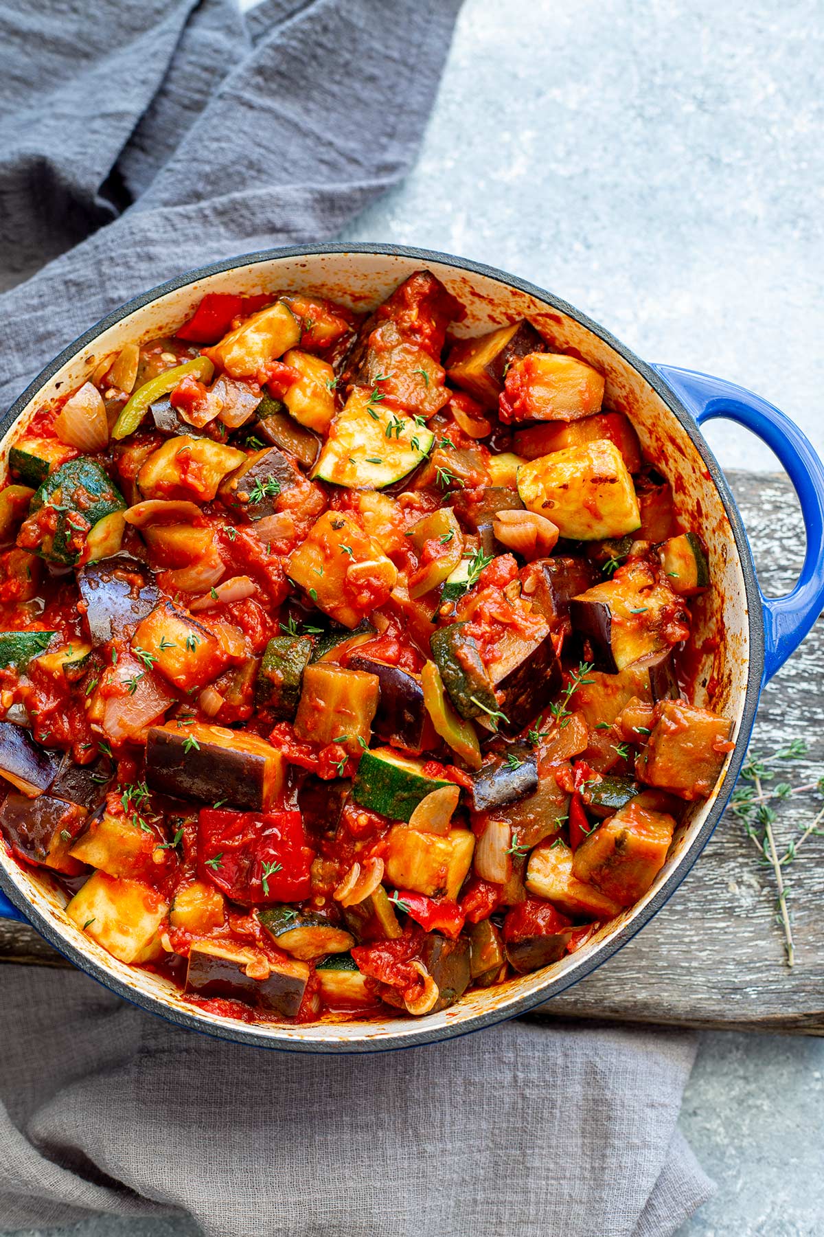 Ratatouille in a large blue pan.