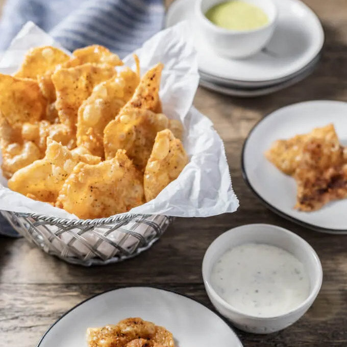 Crispy Chicken Skins with Hot Honey, Creme Fraiche and a Bump of Caviar ...