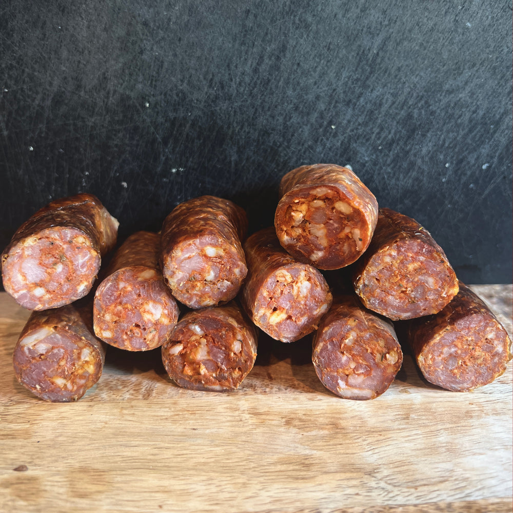 cut ends of chaurice sausage on a cutting board