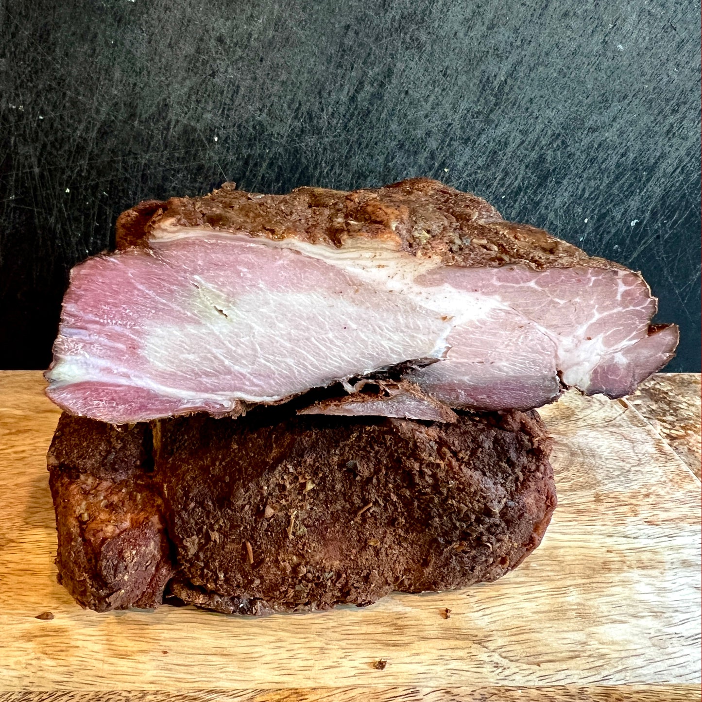 Tasso ham on a cutting board